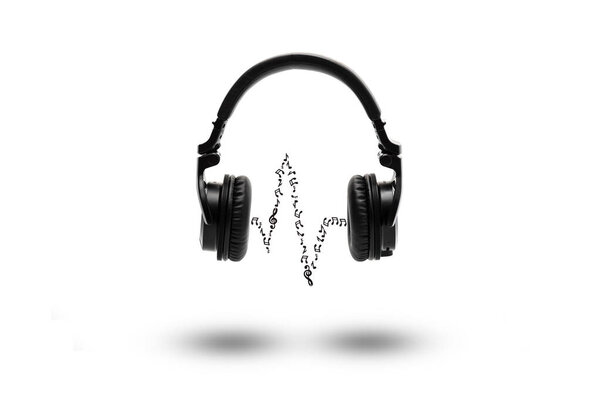 Black wireless headphones with shadow and music flow between speakers on the white background