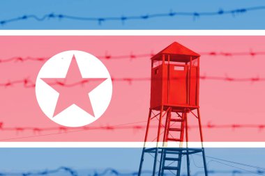 The old watchtower behind the barbed wire fence on the North Korea flag background clipart