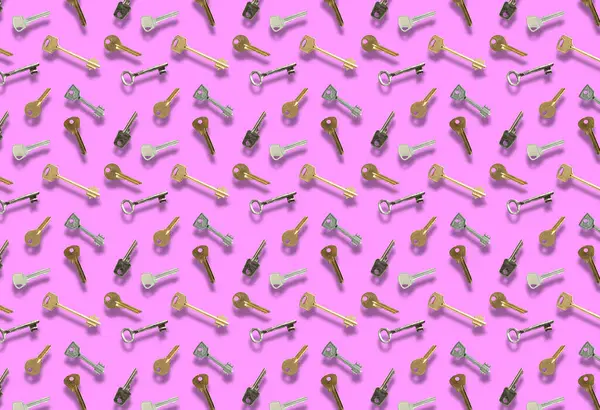 Pembe arka planda farklı anahtarların olduğu desen.