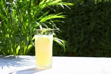 Cold refreshing cocktail of melon with ice and lime slices. Summer cocktails and smoothies.