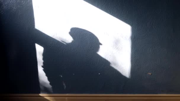 Dark Shadow Man Looking Window Sun Coming Window Bedroom Wall — Vídeo de stock