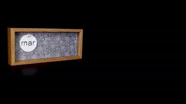A wooden calendar block showing the date March 10th with a mans hand putting on and taking off the discs with the date and month on then, filmed in 8k quality