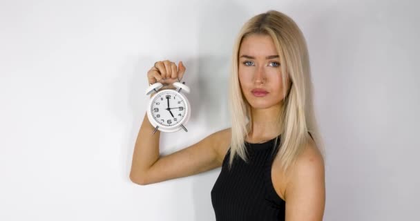Attractive Blonde Haired Woman Holding Old Style Alarm Clock Set — Stockvideo