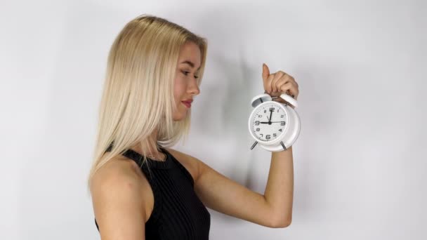Attractive Blonde Haired Woman Holding Old Style Alarm Clock Set — 图库视频影像