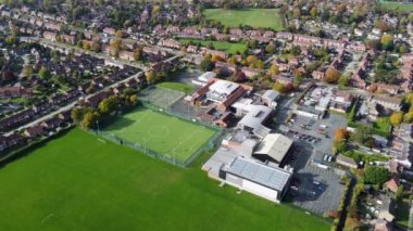 Aerial footage of the the town of Woodthorpe, it's a suburb in the south west of the city of York, North Yorkshire, England showing an aerial view of residential housing estates in the town.