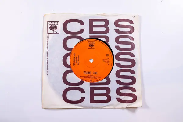 stock image London UK, 4th Feb 2024 An old 7inch vinyl record by the band The Union Gap featuring Gary Puckett with the sixties song Young Girl in its original sleeve