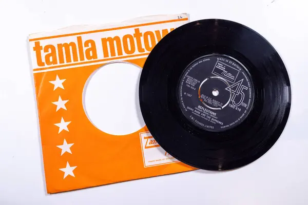 stock image London UK, 4th Feb 2024 An old 7inch vinyl record by the band artist Diana Ross and the Supremes with the sixties song Relections in its original sleeve