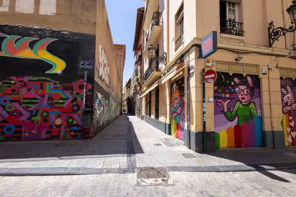 stock image Valencia Spain, 4th July 2024: Photo of the city of Valencia in Spain showing the streets of the city in the summer time with tourists and people walking in the street on a sunny day