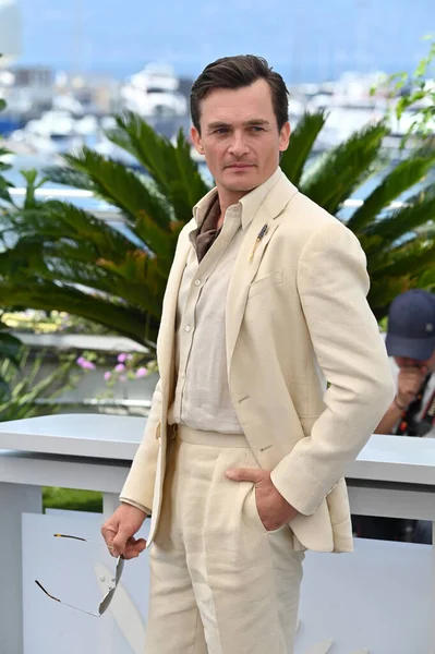 FRANSA, FRANSA. 24 Mayıs 2023: 76. Cannes Festivali 'nde Asteroid Şehri' nin fotoğraf çekiminde Rupert Friend