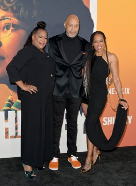LOS ANGELES, USA. March 19, 2024: Reina King, John Ridley and Regina King at the premiere for Shirley at the Egyptian Theatre clipart
