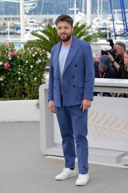 CANNES, FRANCE. May 16, 2024: Tom Burke at the Furiosa A Mad Max Saga photocall at the 77th Festival de Cannes clipart