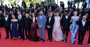 CANNES, FRANCE. May 17, 2024: Andrew Lowe, Kasia Malipan, Ed Guiney, Hunter Schafer, Mamoudou Athie, Jesse Plemons, Yorgos Lanthimos, Emma Stone, Willem Dafoe, Joe Alwyn & Hong Chau at the Kinds of Kindness premiere at the 77th Festival de Cannes clipart