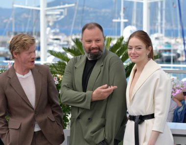 CANNES, FRANCE. May 18, 2024: Jesse Plemons, Yorgos Lanthimos & Emma Stone at the Kinds of Kindness photocall at the 77th Festival de Cannes clipart