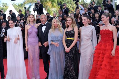 CANNES, FRANCE. May 19, 2024: Hayes Costner, Jena Malone, Abbey Lee Kershaw, Kevin Costner, Sienna Miller, Georgia MacPhail, Ella Hunt & Isabelle Fuhrman at the Horizon: An American Saga premiere at the 77th Festival de Cannes clipart