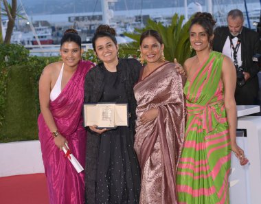 CANNES, FRANCE. May 25, 2024: Divya Prabha, Payal Kapadia, Chhaya Kadam & Kani Kusruti at the Palme d'Or Awards photocall at the 77th Festival de Cannes clipart