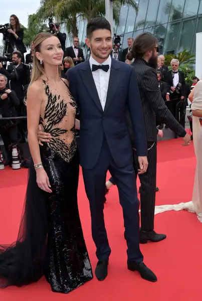 stock image CANNES, FRANCE. May 20, 2024: Flavy Barla & Esteban Ocon at The Apprentice premiere at the 77th Festival de Cannes