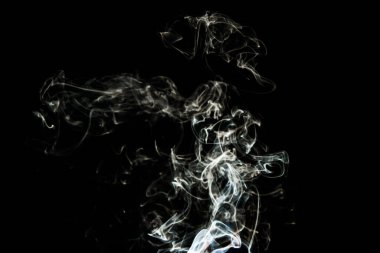 Smoke effect texture. Isolated background. Black and dark backdrop. Smokey fire and mistic effect. Spirit wave. Photo realistic mist stock image.