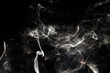 Smoke effect texture. Isolated background. Black and dark backdrop. Smokey fire and mistic effect. Spirit wave. Photo realistic mist stock image.