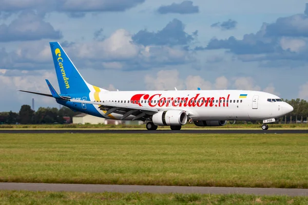 stock image Amsterdam, Netherlands - August 14, 2014: Corendon Airlines passenger plane at airport. Schedule flight travel. Aviation and aircraft. Air transport. Global international transportation. Fly and flying.