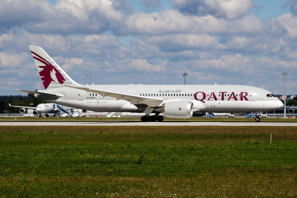 Munich, Germany - July 6, 2016: Qatar Airways passenger plane at airport. Schedule flight travel. Aviation and aircraft. Air transport. Global international transportation. Fly and flying.