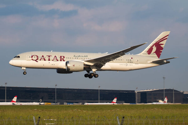 Vienna, Austria - May 13, 2018: Qatar Airways Boeing 787-8 Dreamliner A7-BCA passenger plane arrival and landing at Vienna Airport