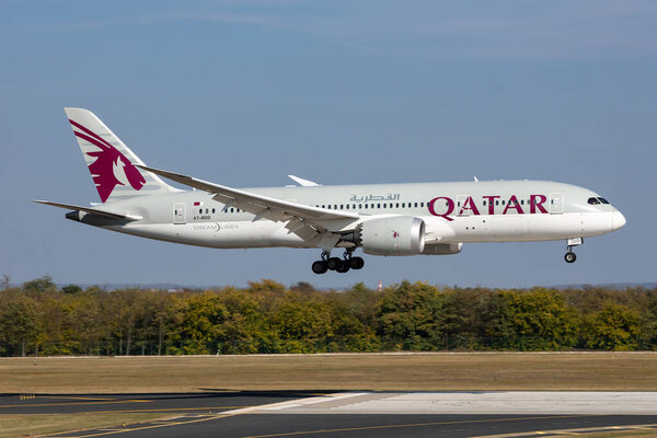 Budapest, Hungary - October 17, 2021: Qatar Airways Boeing 787-8 Dreamliner passenger plane at airport. Aviation and aircraft. Air transport and travel. International transportation. Fly and flying.