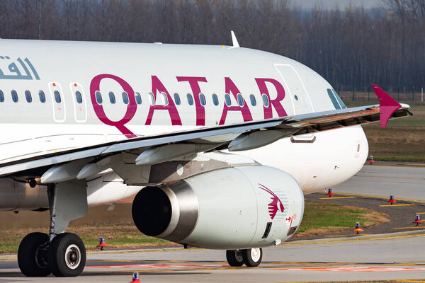 Budapest, Hungary - November 17, 2015: Qatar Airways passenger plane at airport. Schedule flight travel. Aviation and aircraft. Air transport. Global international transportation. Fly and flying.