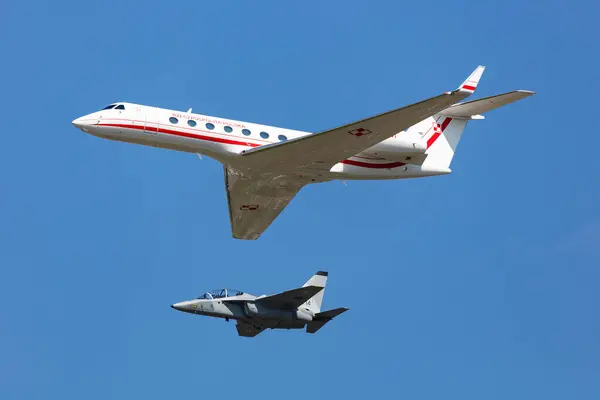 stock image Radom, Poland - August 26, 2023: Polish Air Force Gulfstream G550 VIP presidental transport plane flying. Aviation and military aircraft.