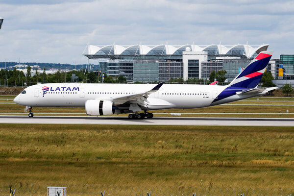 Munich / Germany - July 11, 2017: Qatar Airways (LATAM) Airbus A350-900 A7-AMD passenger plane departure and take off at Munich Airport