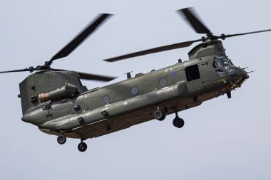FAIRFORD / UNITED KINGDOM - JULY 13, 2018: Royal Air Force CH-47 Chinook HC6 ZH891 transport helicopter display for RIAT Royal International Air Tattoo 2018 airshow clipart