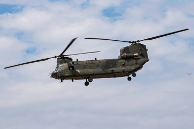 FAIRFORD / UNITED KINGDOM - JULY 13, 2018: Royal Air Force CH-47 Chinook HC6 ZH891 transport helicopter display for RIAT Royal International Air Tattoo 2018 airshow clipart
