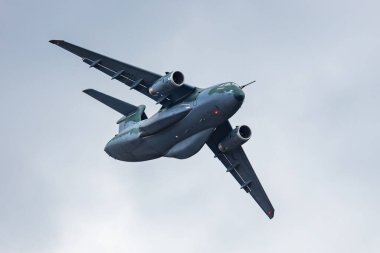 Kecskemet, Hungary - August 27, 2021: Embraer KC-390 Millennium. Military transport plane at air base. Air force flight operation. Aviation and aircraft. Air lift. Military industry. Fly and flying.