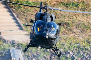 Szolnok, Hungary - August 18, 2022: Hungarian Air Force Airbus Helicopters H145M military utility helicopter. Flight operation. Aviation industry and rotorcraft. Transport and airlift. Fly and flying clipart