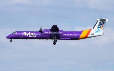 Amsterdam, Netherlands - July 3, 2017: Flybe passenger plane at airport. Schedule flight travel. Aviation and aircraft. Air transport. Global international transportation. Fly and flying. clipart