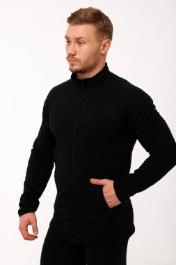 Athletic man in thermal underwear on a white background. Thermal underwear for men