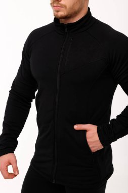 Athletic man in thermal underwear on a white background. Thermal underwear for men