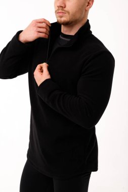 Athletic man in thermal underwear on a white background. Thermal underwear for men