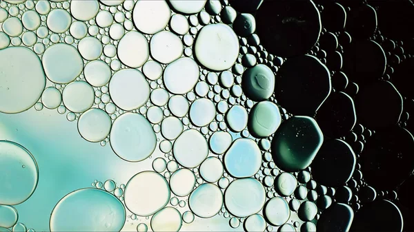 stock image Abstract Colorful Food Oil Drops Bubbles and spheres Flowing on Water Surface Macro Photography