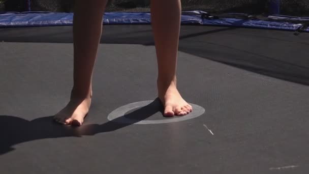 Teen Child Jumping Trampoline — Vídeo de stock