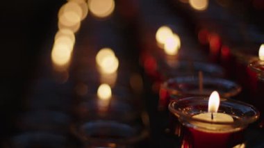 Red Wish and Pray Candles in a Catholic Church