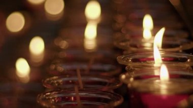 Red Wish and Pray Candles in a Catholic Church