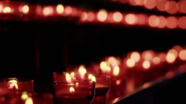 Red Wish and Pray Candles in a Catholic Church