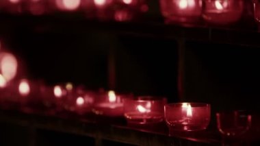 Red Wish and Pray Candles in a Catholic Church