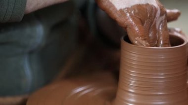 Working with Clay in Ceramic Workshop 