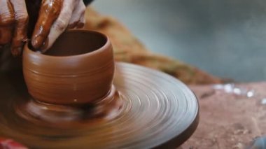 Working with Clay in Ceramic Workshop 