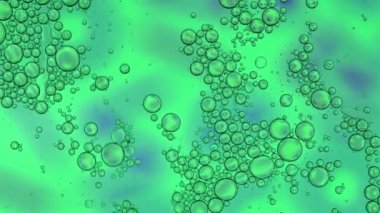 Soyut Renkli Gıda Yağı Kabarcıkları ve küreler Bir Yüzeye Akıyor