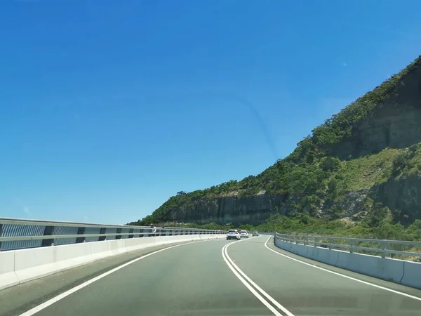 24 November 2022 - Stanwell Tops, NSW, Australia: Grand Pacific Drive. High quality photo taken on blue sky day.