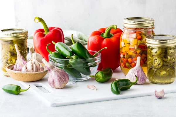 Close Canning Jars Sliced Jalapeno Peppers Diced Sweet Bell Peppers — Stock Photo, Image