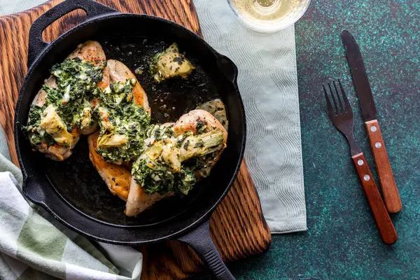Homemade Spinach Artichoke Chicken Breasts Cast Iron Fry Pan Ready Stock Image