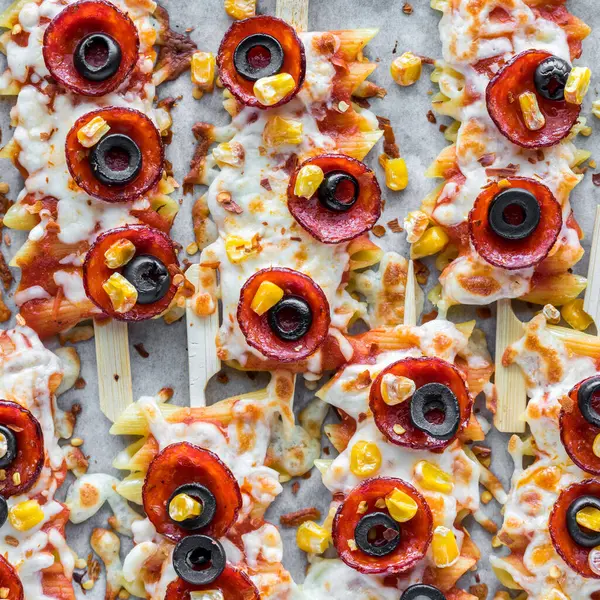 Above, close up view of homemade pasta pizza skewers, a great after school snack.